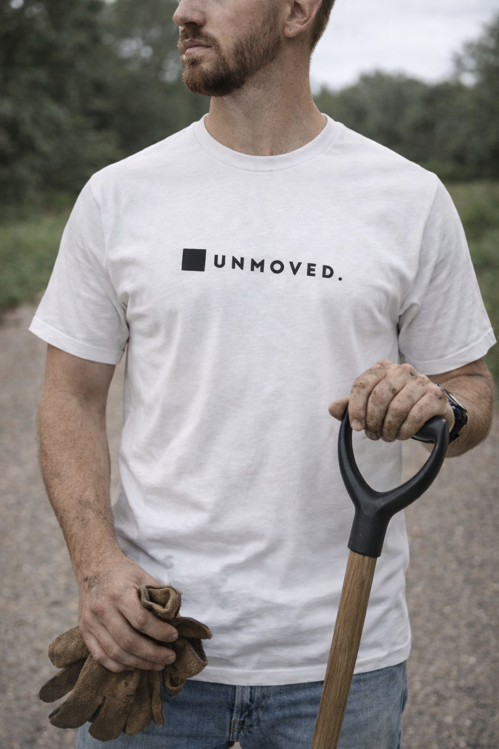 UNMOVED. Tee